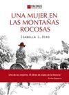 UNA MUJER EN LAS MONTAÑAS ROCOSAS