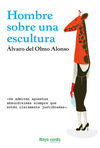 HOMBRE SOBRE UNA ESCULTURA